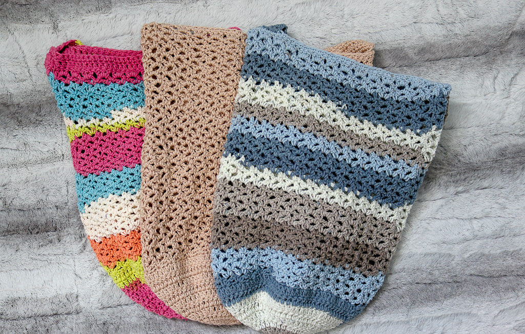 Three Crochet Totes displayed on a flat lay.