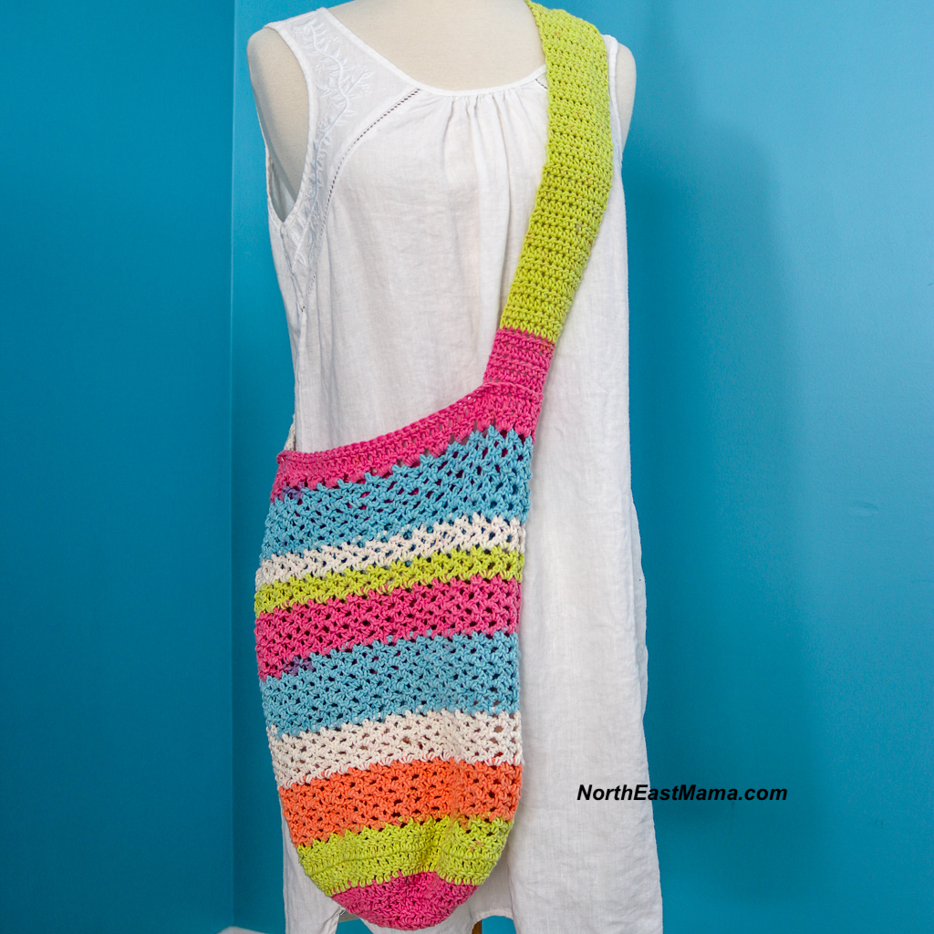 Crochet tote displayed on a mannequin